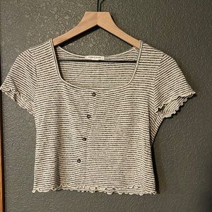 Size small. Brand - caution to the wind